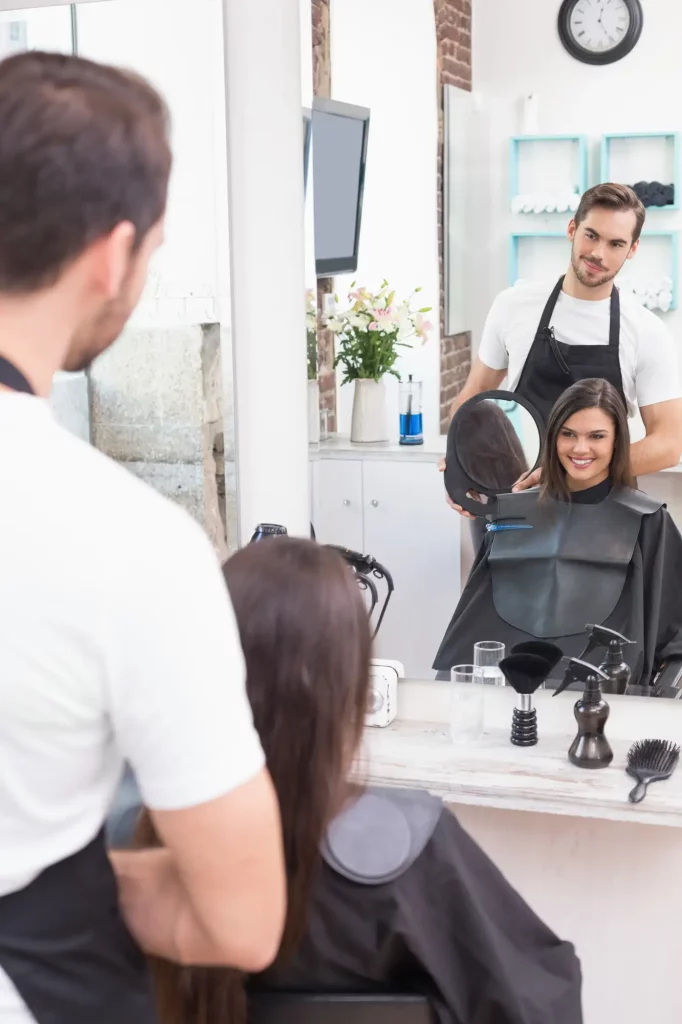 Pretty brunette getting her hair cut
